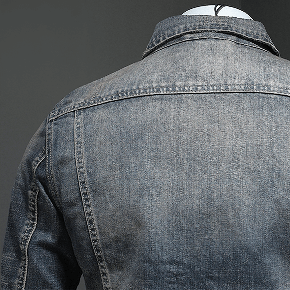 Men's gray denim jacket back view, showcasing its fitted casual design and stylish appeal.