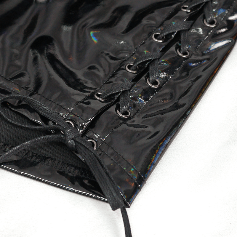 Close-up of edgy gothic faux leather mini skirt featuring lace-up details on both sides.