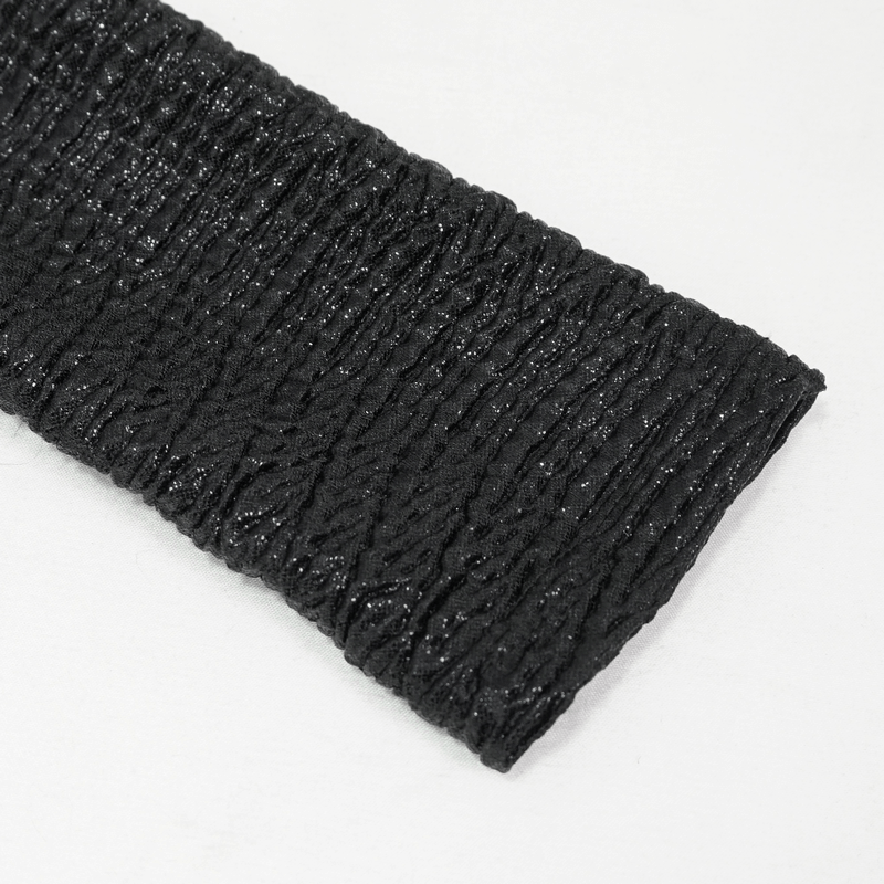 Close-up of textured black fabric with intricate pleats, perfect for a punk style women's high collar top.
