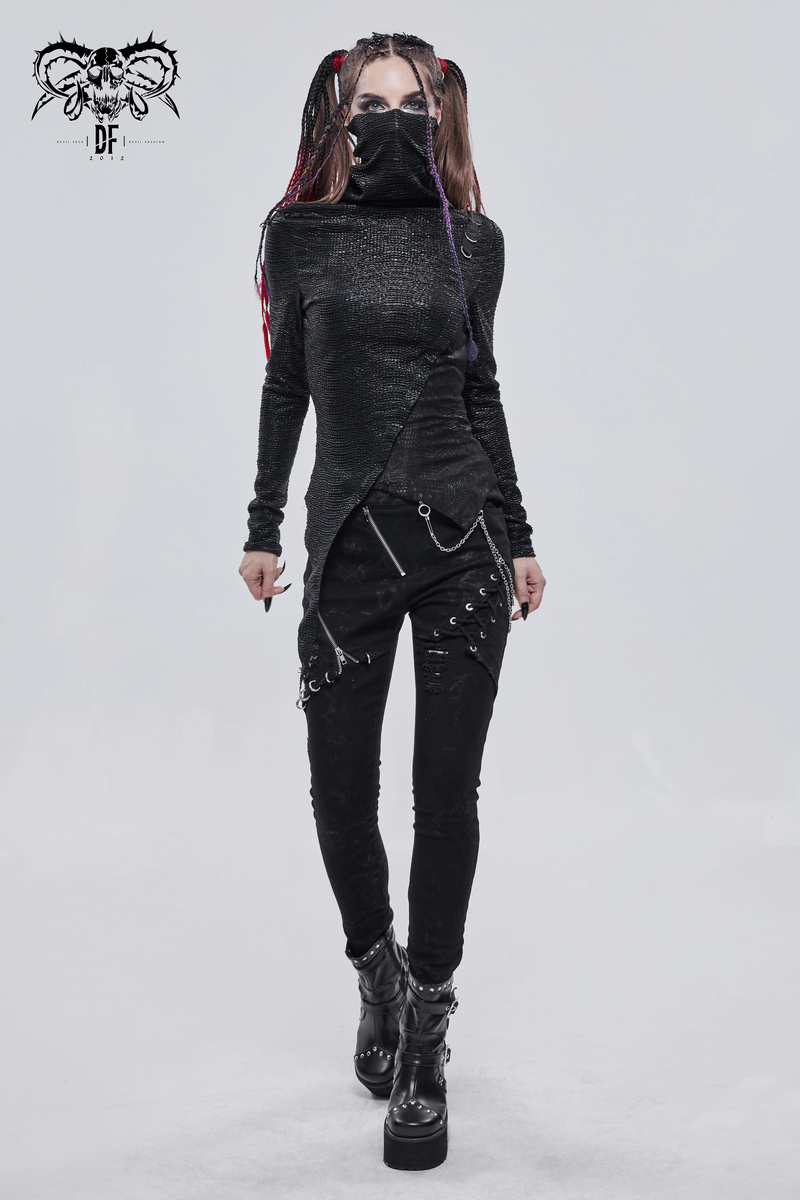 Punk style women's black top with breathing mask, fitted cut, paired with stylish black pants and chunky boots.