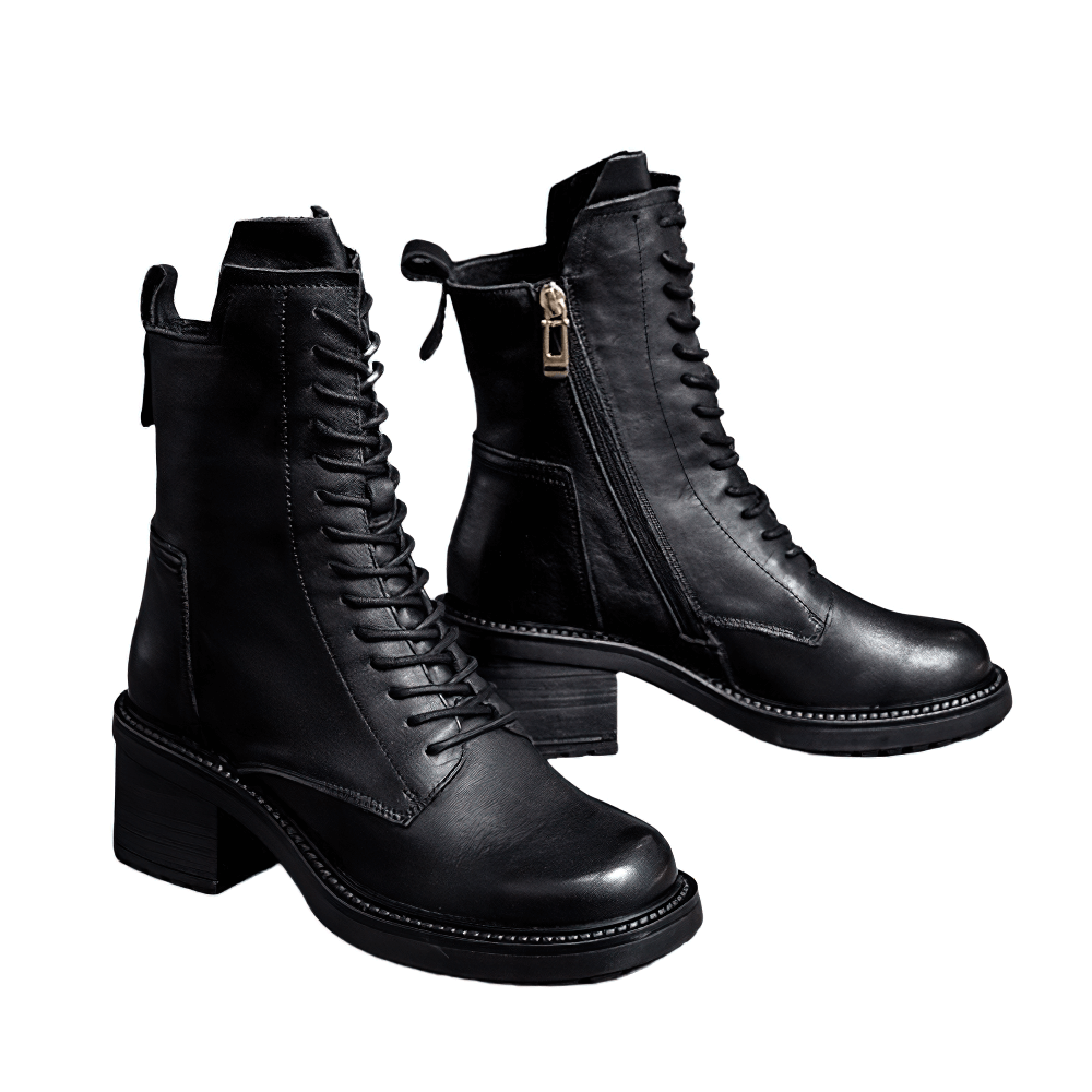 Fashion ladies' black leather ankle boots with lace-up and zipper detail, perfect for modern casual style.