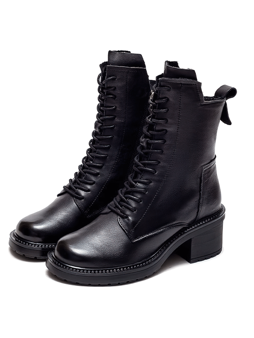 Trendy black ankle boots for women made of genuine leather with lace-up design and stylish heel.