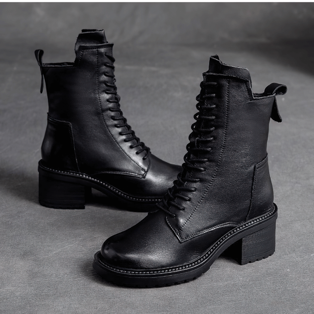 Fashion ladies genuine leather ankle boots with lace-up design, modern casual shoes in sleek black.