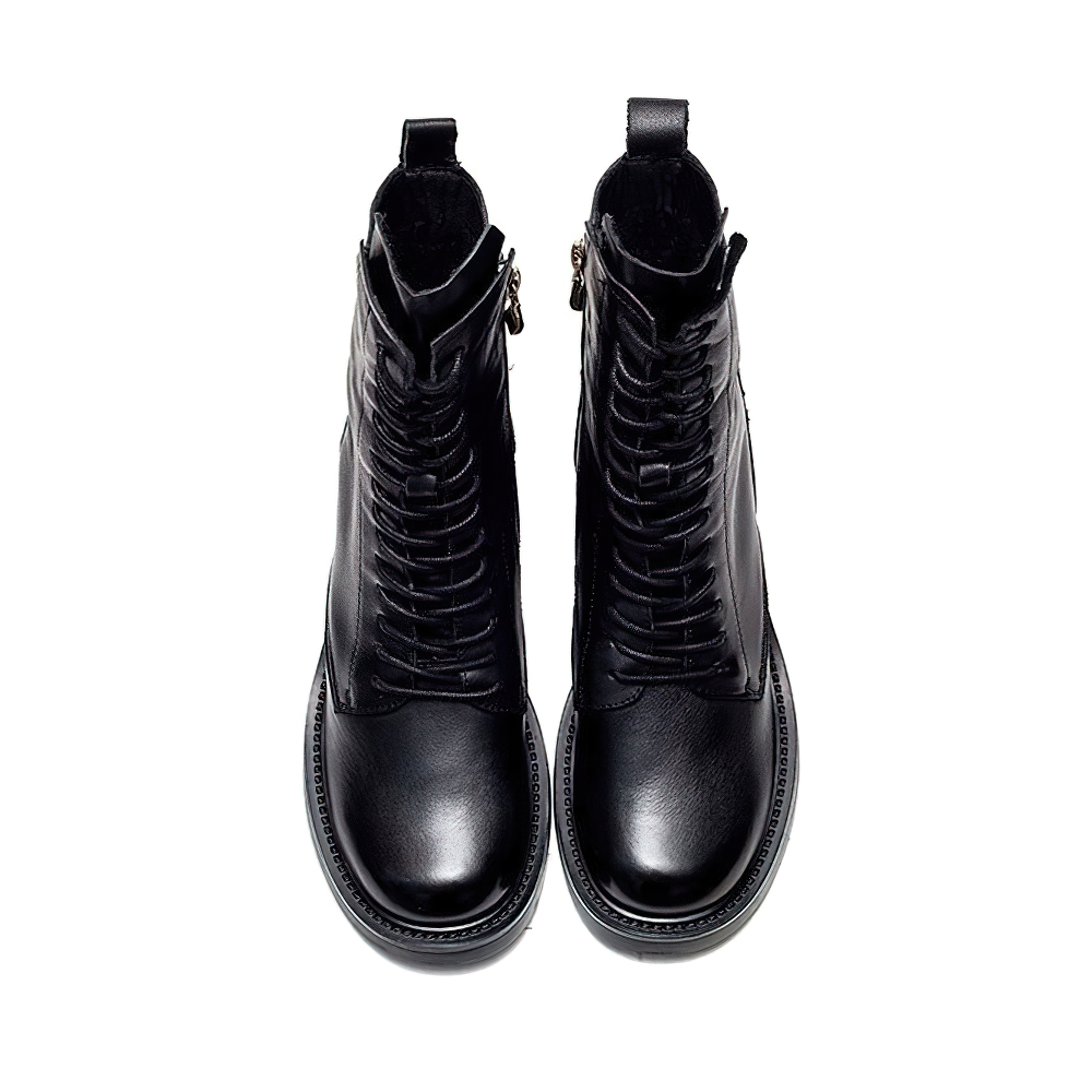 Fashion ladies ankle boots in genuine leather with lace-up design, perfect for modern casual style.