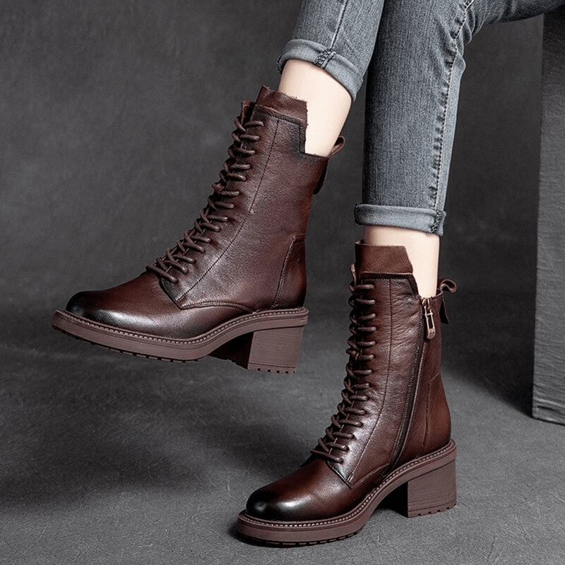 Brown genuine leather ankle boots with lace-up design for modern casual style, perfect for ladies.
