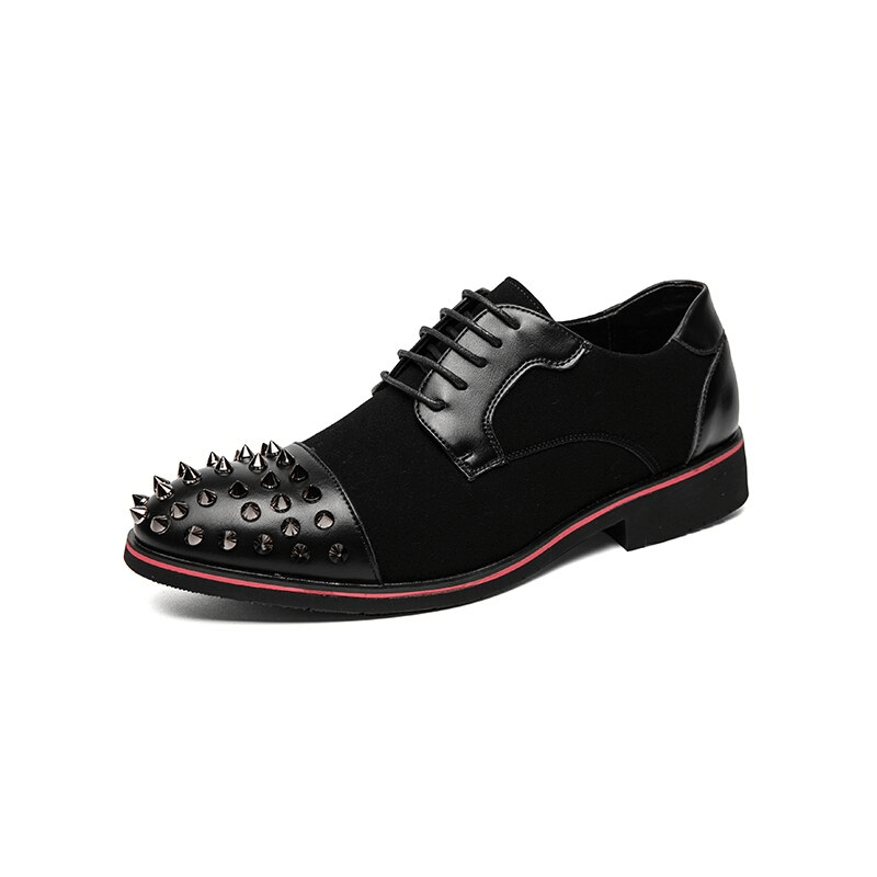 Men's black dress shoes with spikes, lace-up design, perfect for alternative fashion and bold statements.