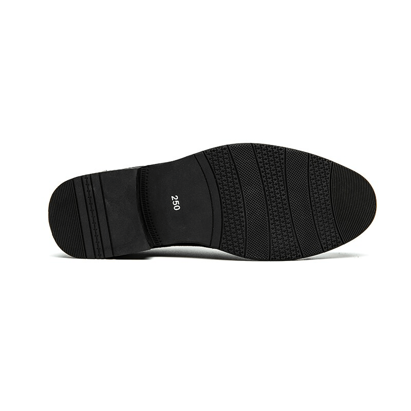 Sleek black sole of men's dress shoes featuring textured grip for ultimate style and stability.