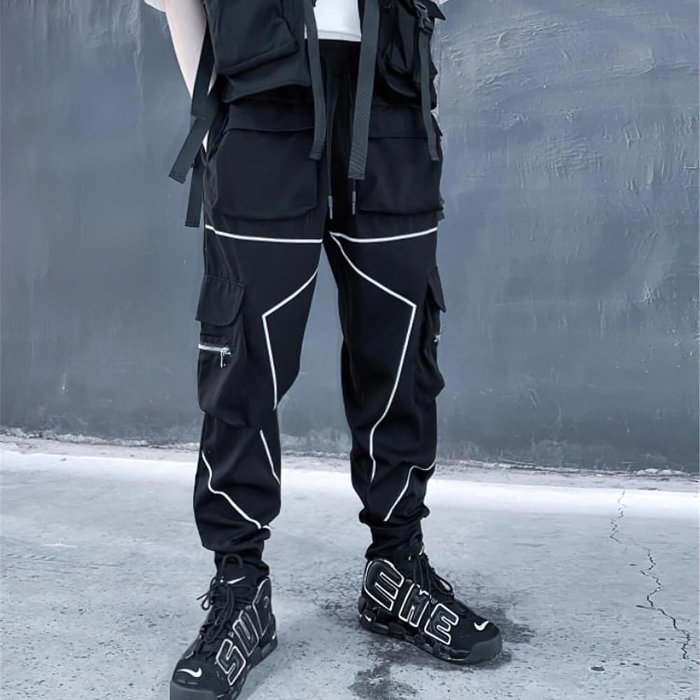 Men's patchwork cargo trousers with multiple pockets and elastic waist, ideal for an edgy alternative fashion look.