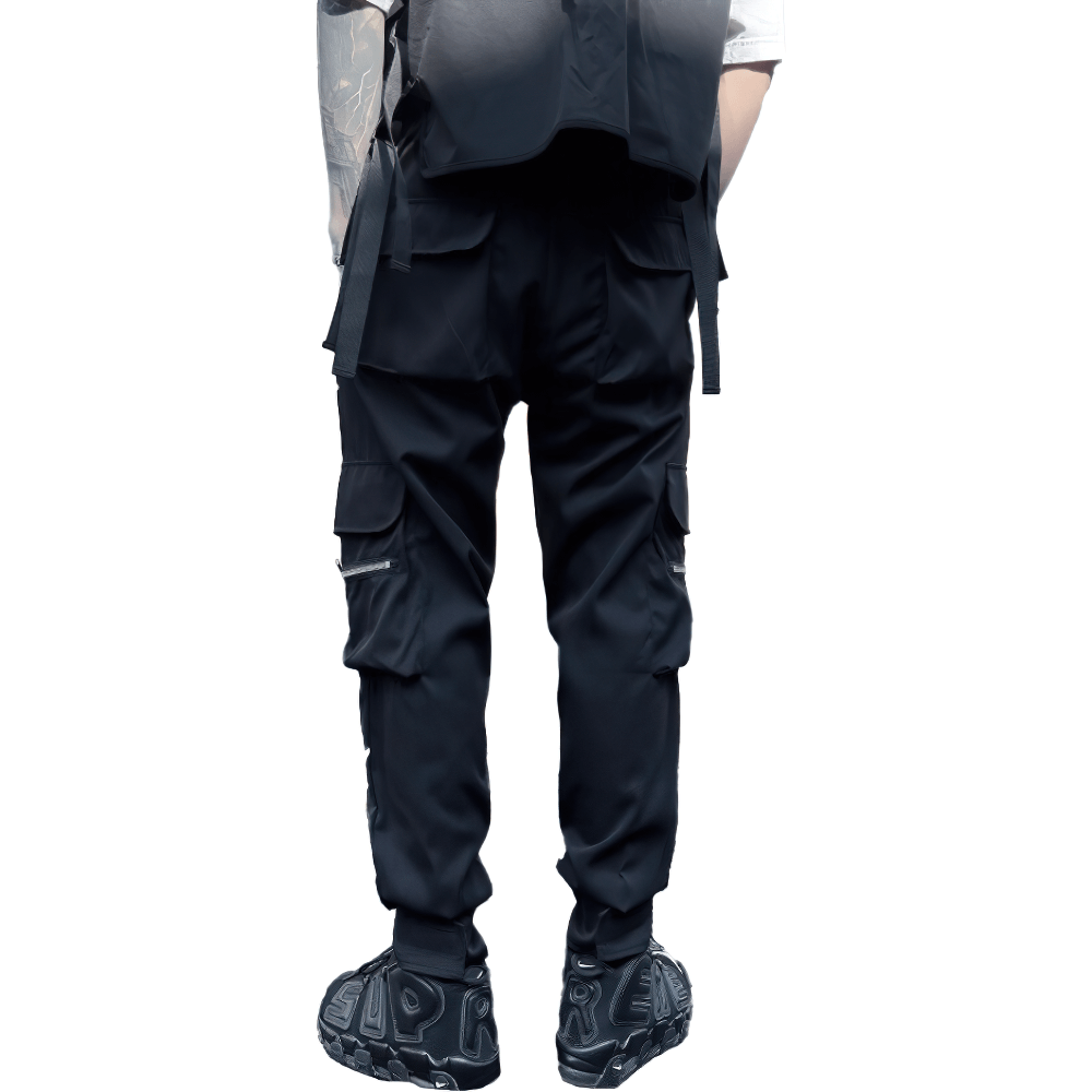 Men's black patchwork cargo trousers with pockets, elastic waist and stylish urban look, perfect for a trendy outfit.