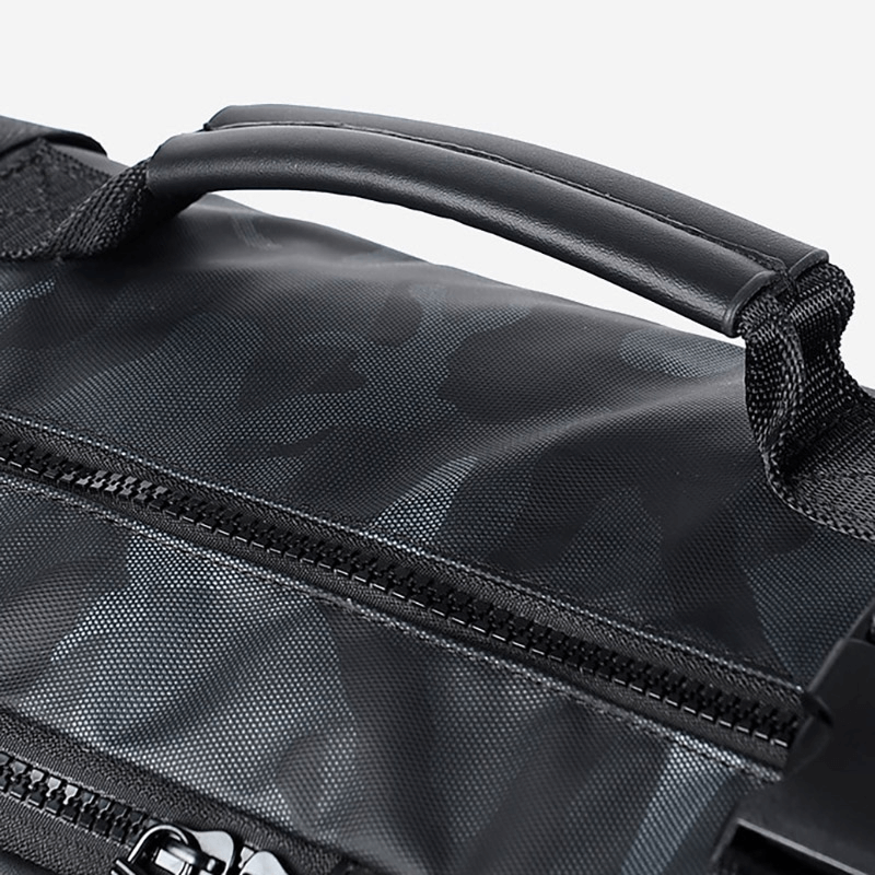 Close-up of the handle on a fashion multifunctional waterproof backpack in black.