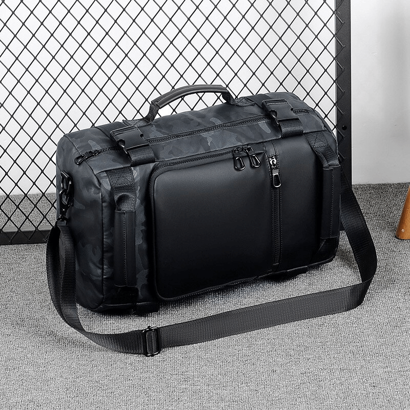 Stylish black multifunctional waterproof duffel bag with practical compartments and adjustable strap.