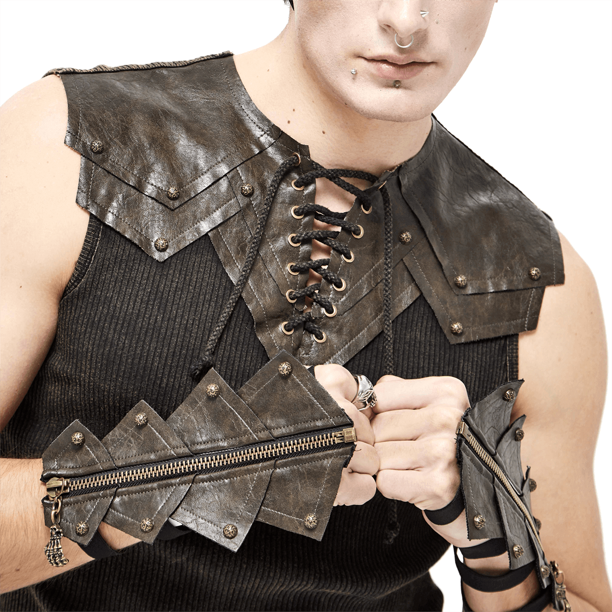 Fashionable gothic model wearing edgy PU leather armor and accessories with zippers and studs.