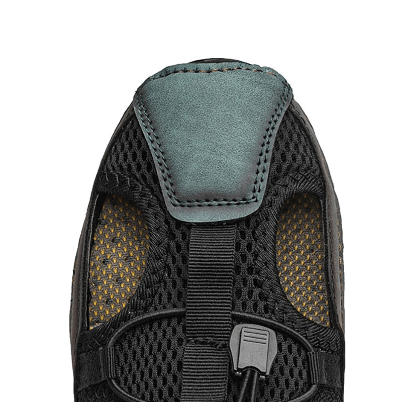 Close-up of breathable non-slip leather sandal for men, showcasing stylish mesh and leather design.