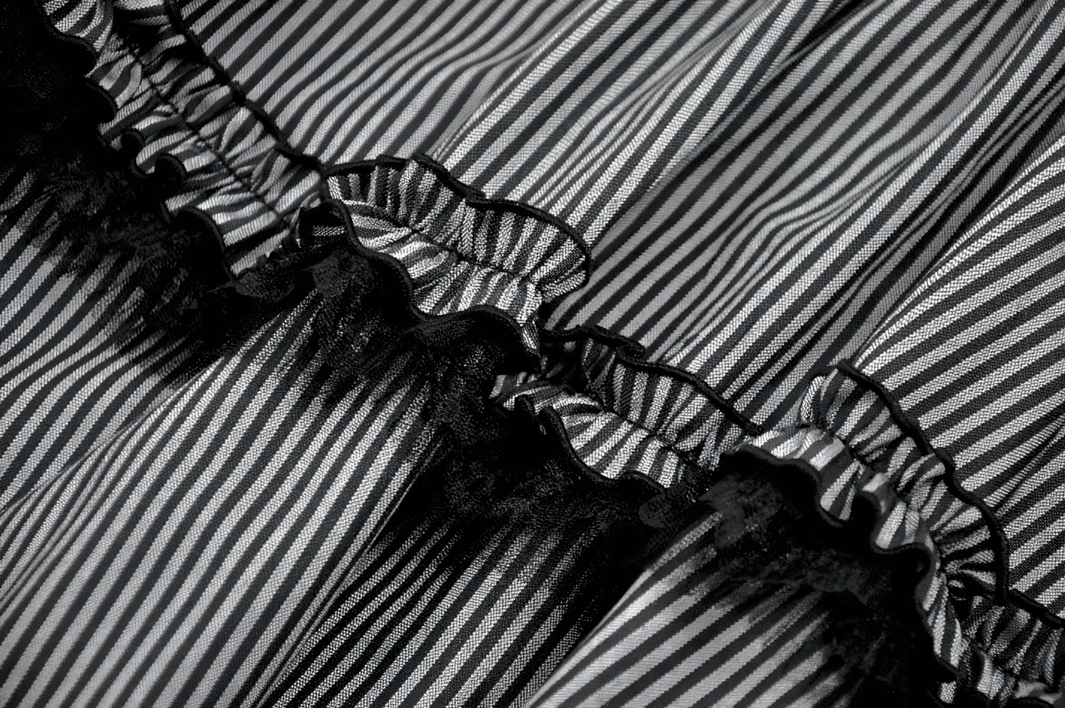 Fashion Pinstripe Ruffle Dress with Lace Hem and Belt featuring ruffled neckline and black lace trim.