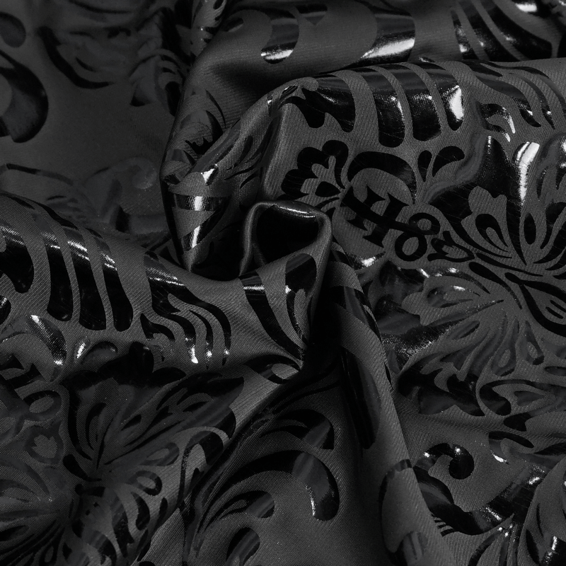 Close-up of stylish black fabric featuring bold floral patterns and a glossy finish, perfect for punk fashion designs.