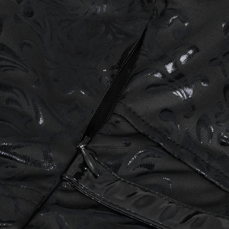 Close-up of the chic lace-up back details on a black punk V-neck dress with elegant patterns.