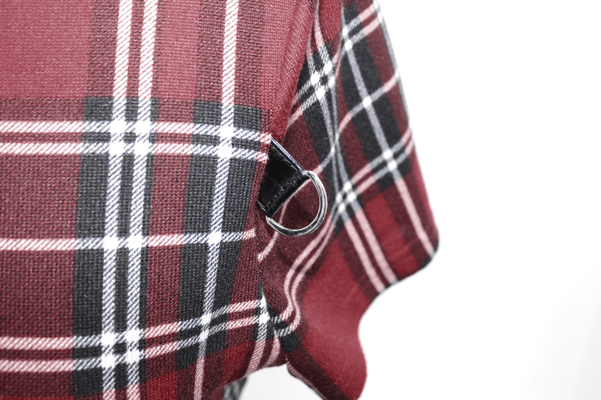 Close-up of red plaid fabric featuring a silver chain ring detail, perfect for punk-style clothing.