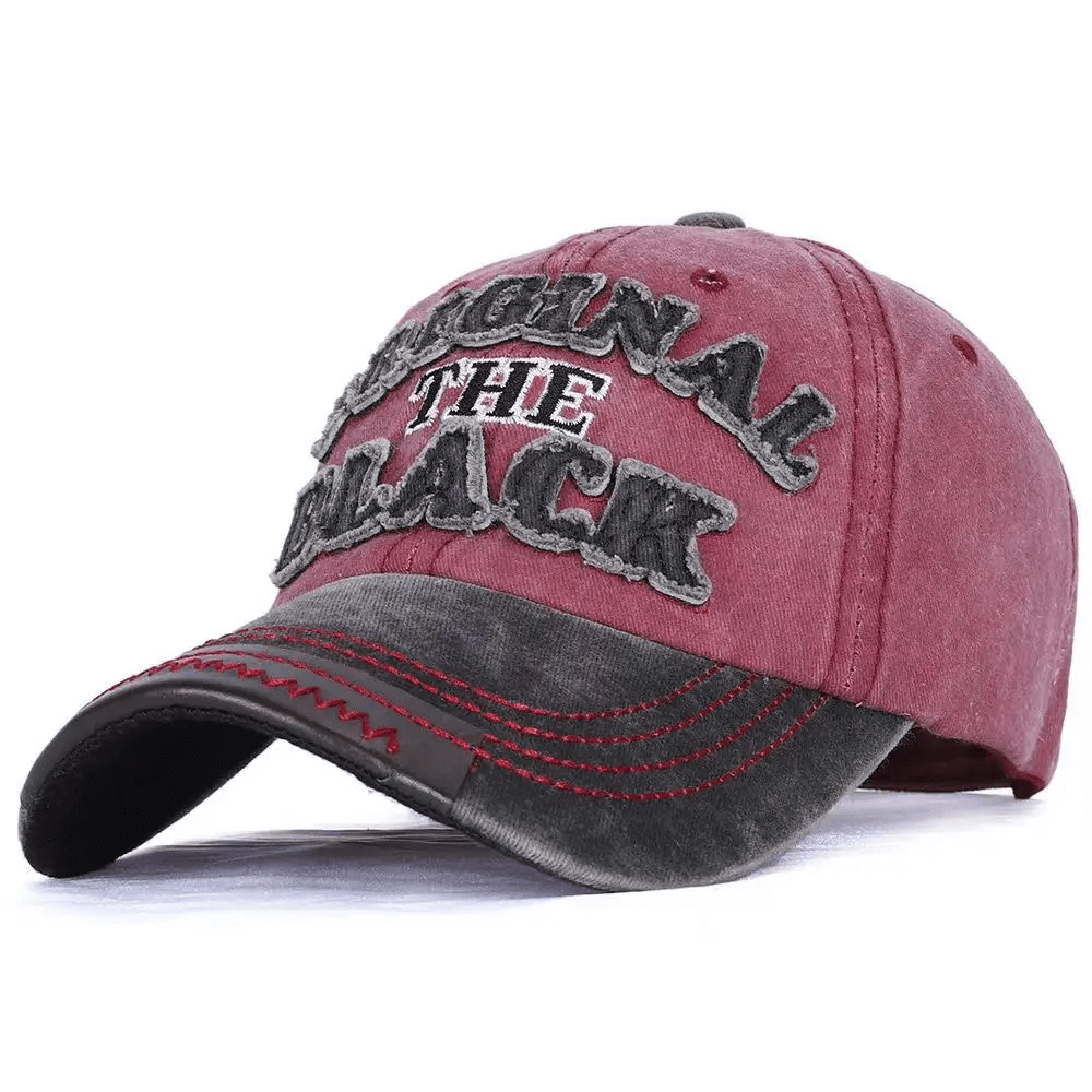 Fashion retro washed baseball cap in maroon and black with embroidery for a casual rock style.