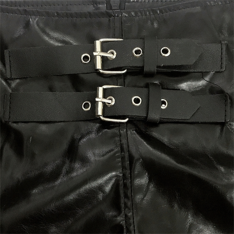 Close-up of stylish black PU leather shorts featuring bold buckle and strap details for women.