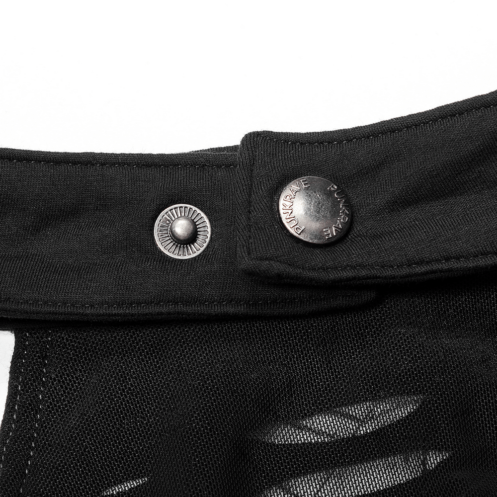 Close-up view of black spider web mesh cutout halter top showing adjustable neck and stylish buttons.