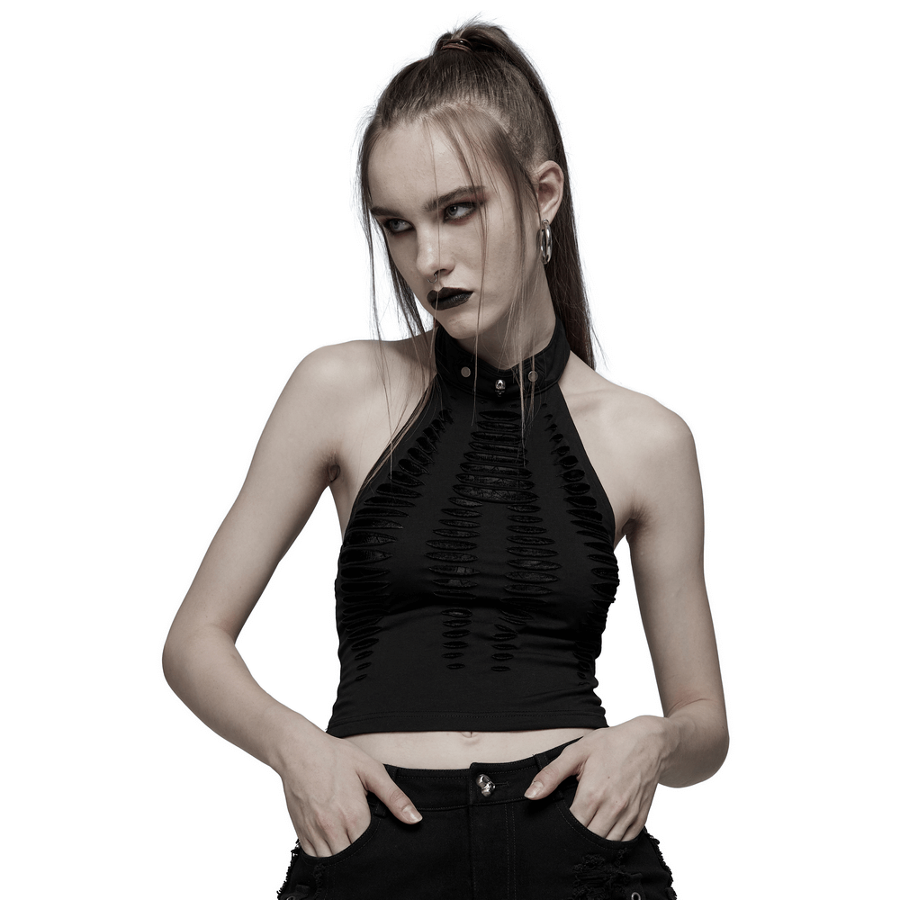 Model showcasing edgy black halter top with spider web cutouts, perfect for bold fashion statements.