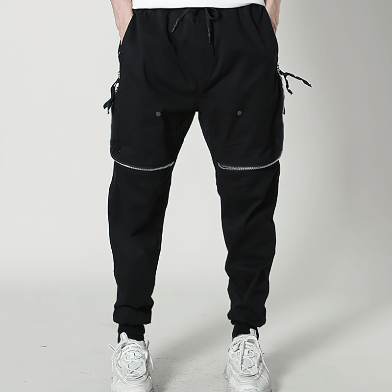 Men's black tactical zipper trousers with elastic waist and functional pockets for a stylish, edgy look.