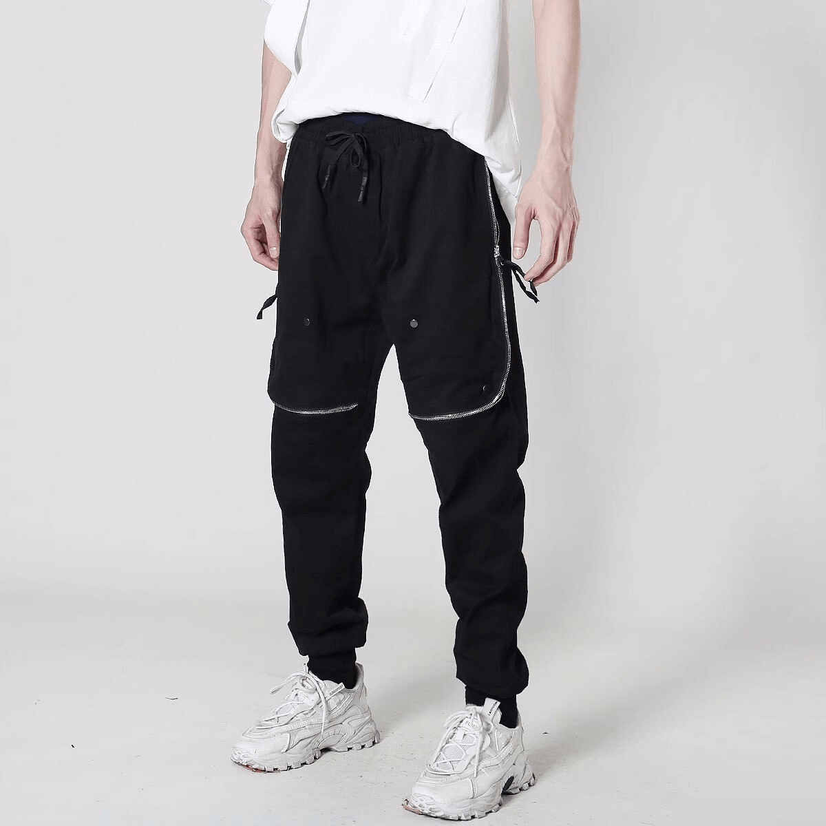 Men's fashion tactical zipper trousers with elastic waist, perfect for alternative style and everyday comfort.