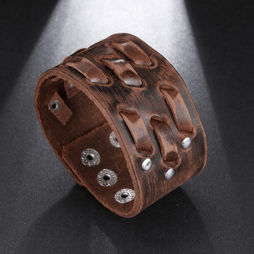 Wide genuine leather bracelet with vintage punk design, perfect for stylish outfits and lasting wear.