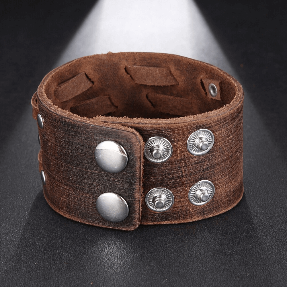 Fashion wide genuine leather bracelet in brown with silver studs, perfect for vintage punk jewelry lovers.