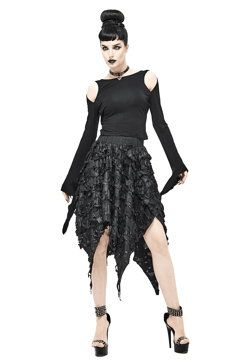 Fashionable gothic woman in black asymmetric hem skirt, showcasing a trendy style with a unique, edgy flair.