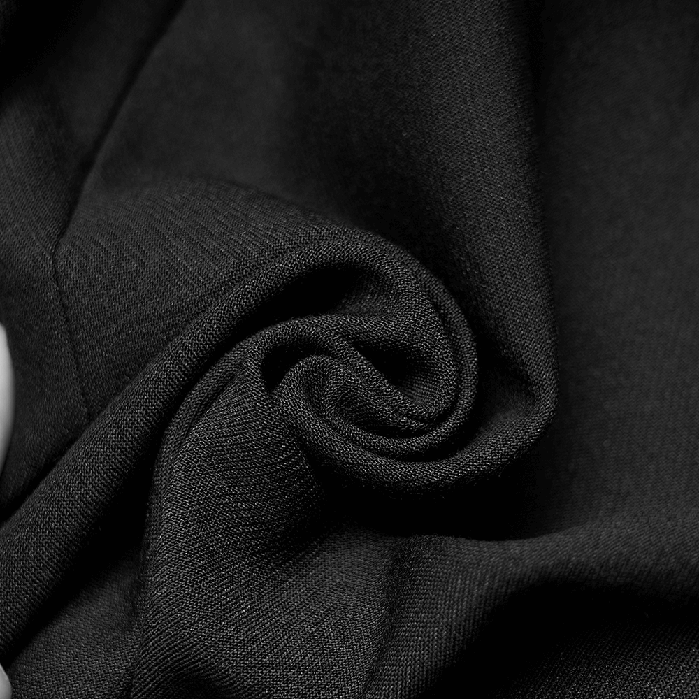 Close-up of soft black fabric, showcasing its luxurious texture and quality for a stylish A-line skirt.