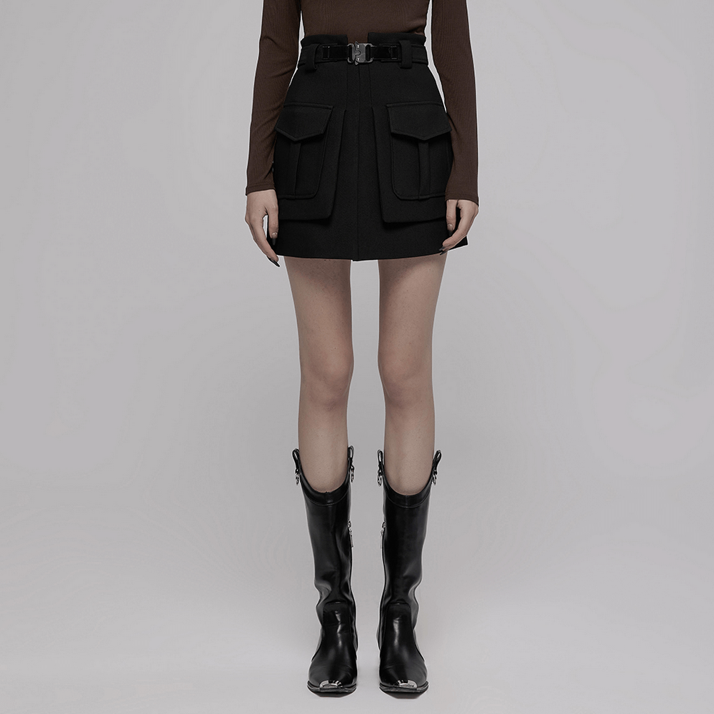 Trendy high-waist A-line skirt with buckle and pockets, styled with chic black boots.
