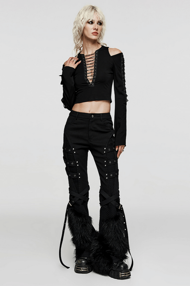 Urban punk model showcasing faux fur trimmed straight pants with edgy mesh details and stylish cropped top.
