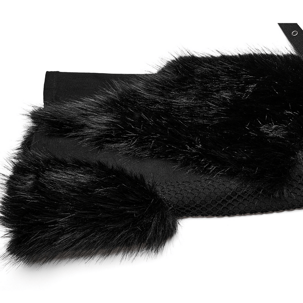Close-up of faux fur trimmed detail on black punk straight pants with mesh texture.