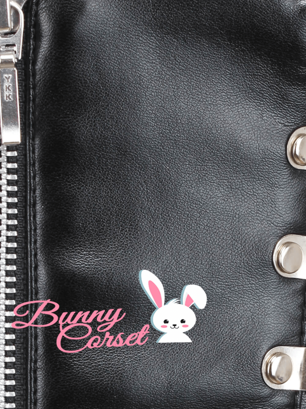 Close-up of black faux leather Bunny Corset featuring zipper and cute bunny graphic.