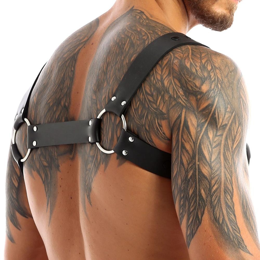 Men's gothic faux leather body harness featuring metal o-rings and adjustable straps for a bold, stylish look.