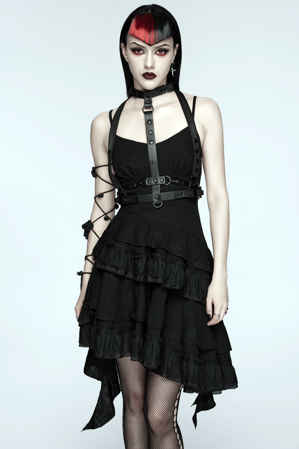 Faux Leather Cyberpunk Skeleton Harness with Chains worn by model in black dress, showcasing punk style and edgy design.