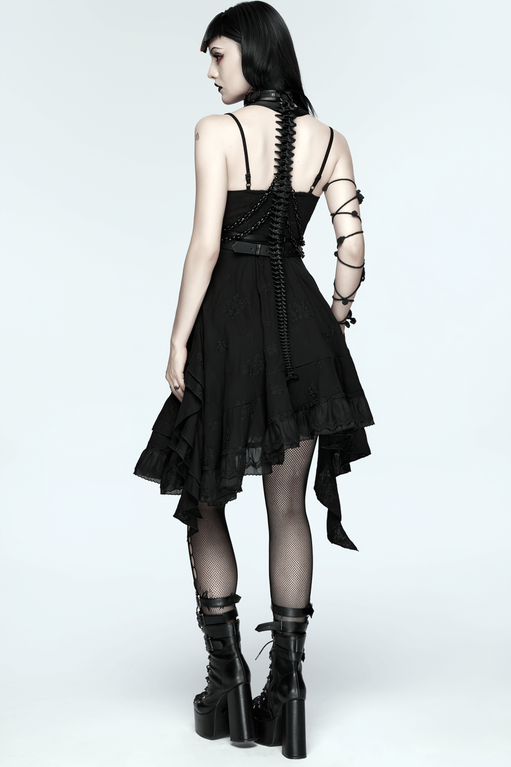 Faux Leather Cyberpunk Skeleton Harness with Chains worn over a stylish black dress.