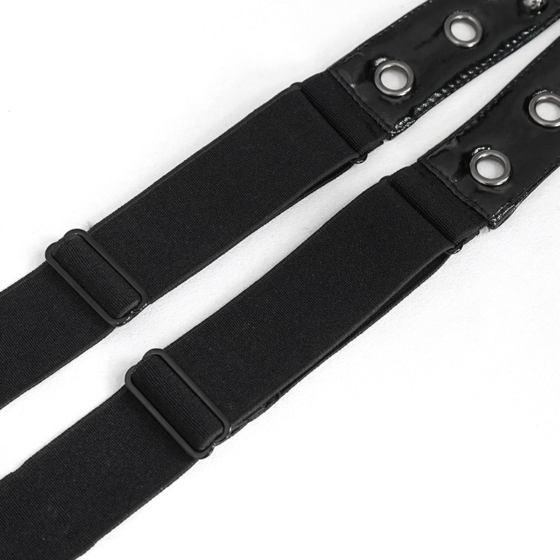 Close-up of black faux leather double-layer waistband belt with adjustable straps and bold metal grommets.