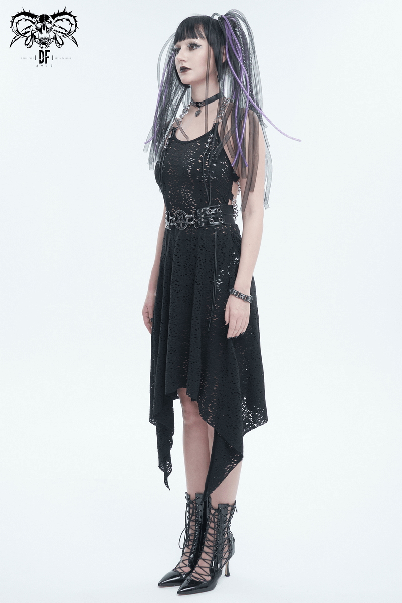 Gothic model in a black sequined dress, showcasing a dramatic silhouette and accessories, embodying edgy style.
