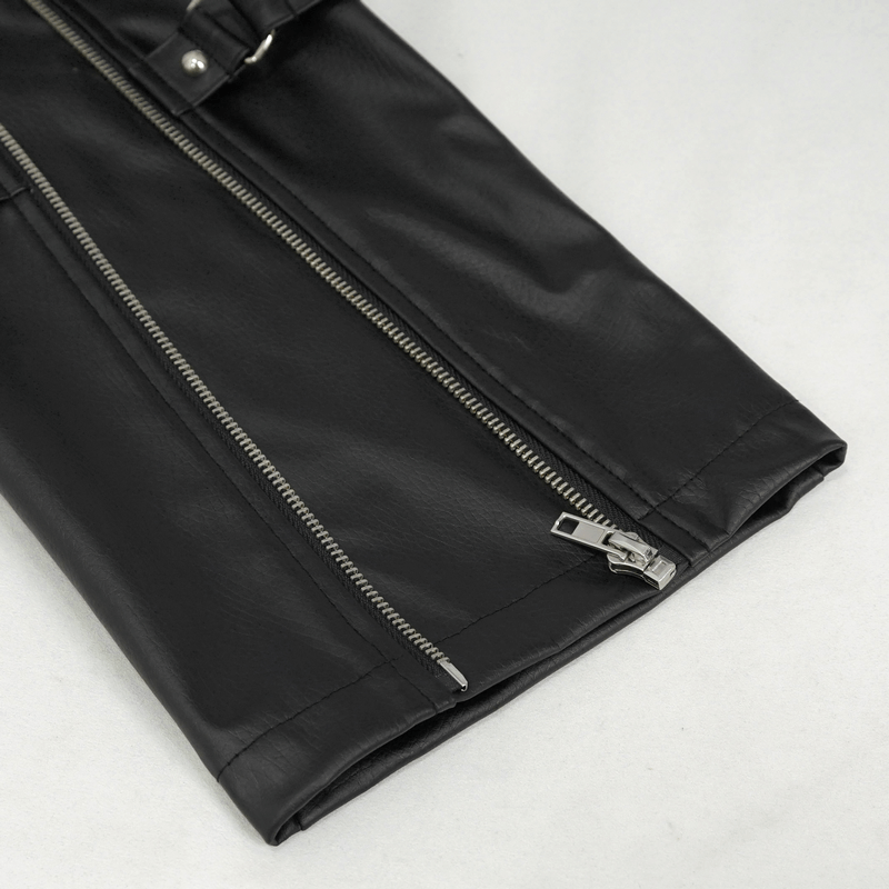 Detail of punk-inspired faux leather fitted pants showcasing stylish zippers and detachable strap.