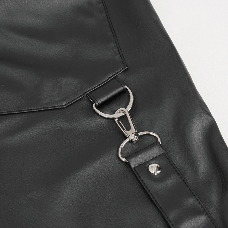 Close-up of detachable strap on black faux leather fitted pants, showcasing stylish punk-inspired design.