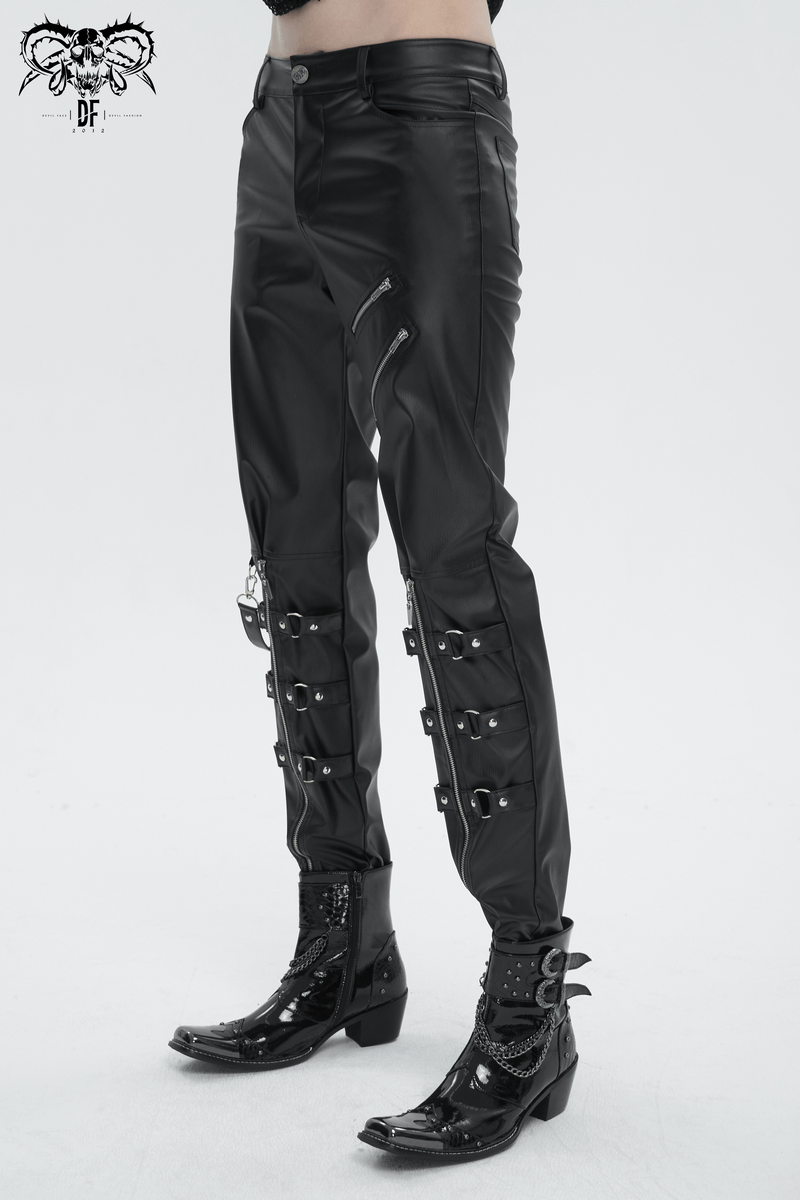 Men's punk-inspired faux leather fitted pants with detachable straps and pockets, styled with edgy boots.