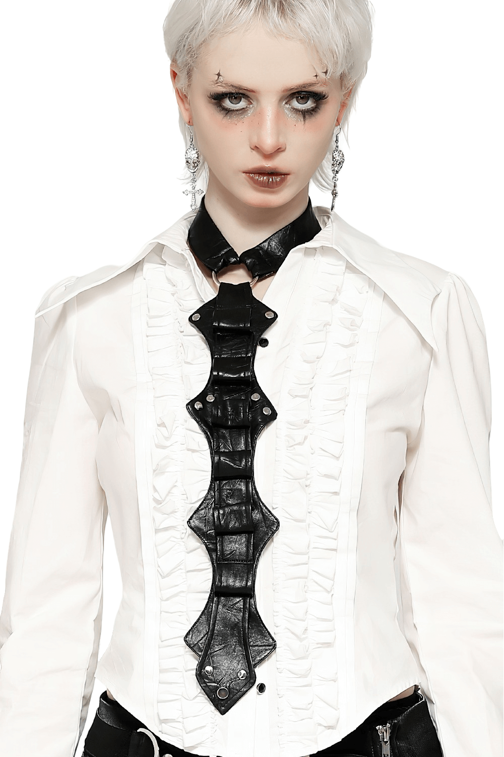 Trendy goth model wearing faux leather neck harness over a white ruffled shirt, showcasing punk style and rivet detail.