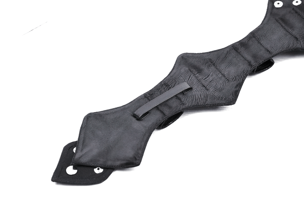 Close-up of a black faux leather gothic neck harness featuring rivet details and adjustable straps for a punk-inspired look.