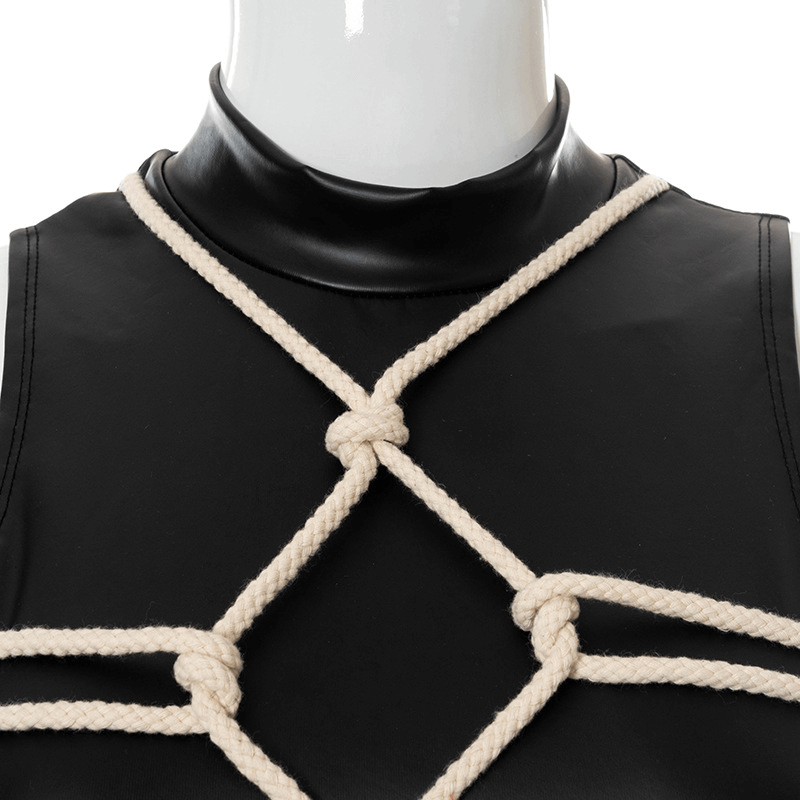 Close-up of faux leather bodysuit with striking cross rope detailing for a gothic punk look.