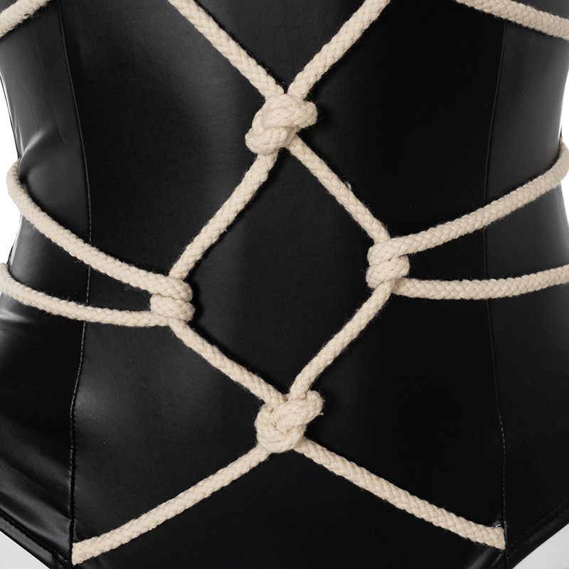 Close-up of faux leather bodysuit with intricate cross rope detailing, showcasing gothic punk style.