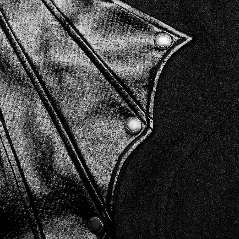 Close-up of faux leather detail on Gothic coat showcasing asymmetrical design and decorative buttons.