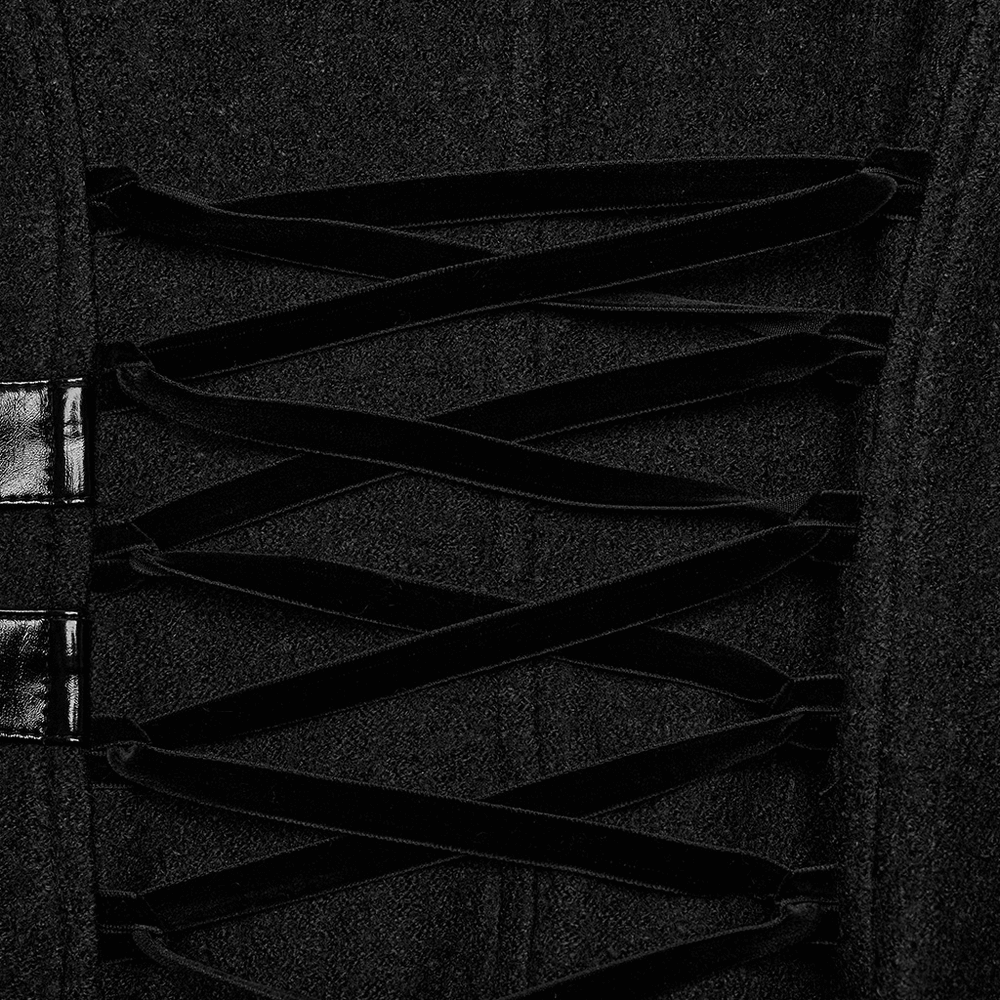 Close-up of faux leather and wool blend gothic coat with unique lacing detail and asymmetrical design.