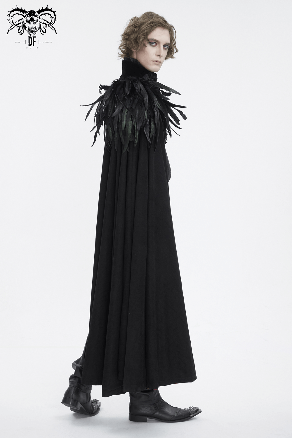 Chic black asymmetric cape with feather accents, perfect for glamorous evening events and fashion statements.